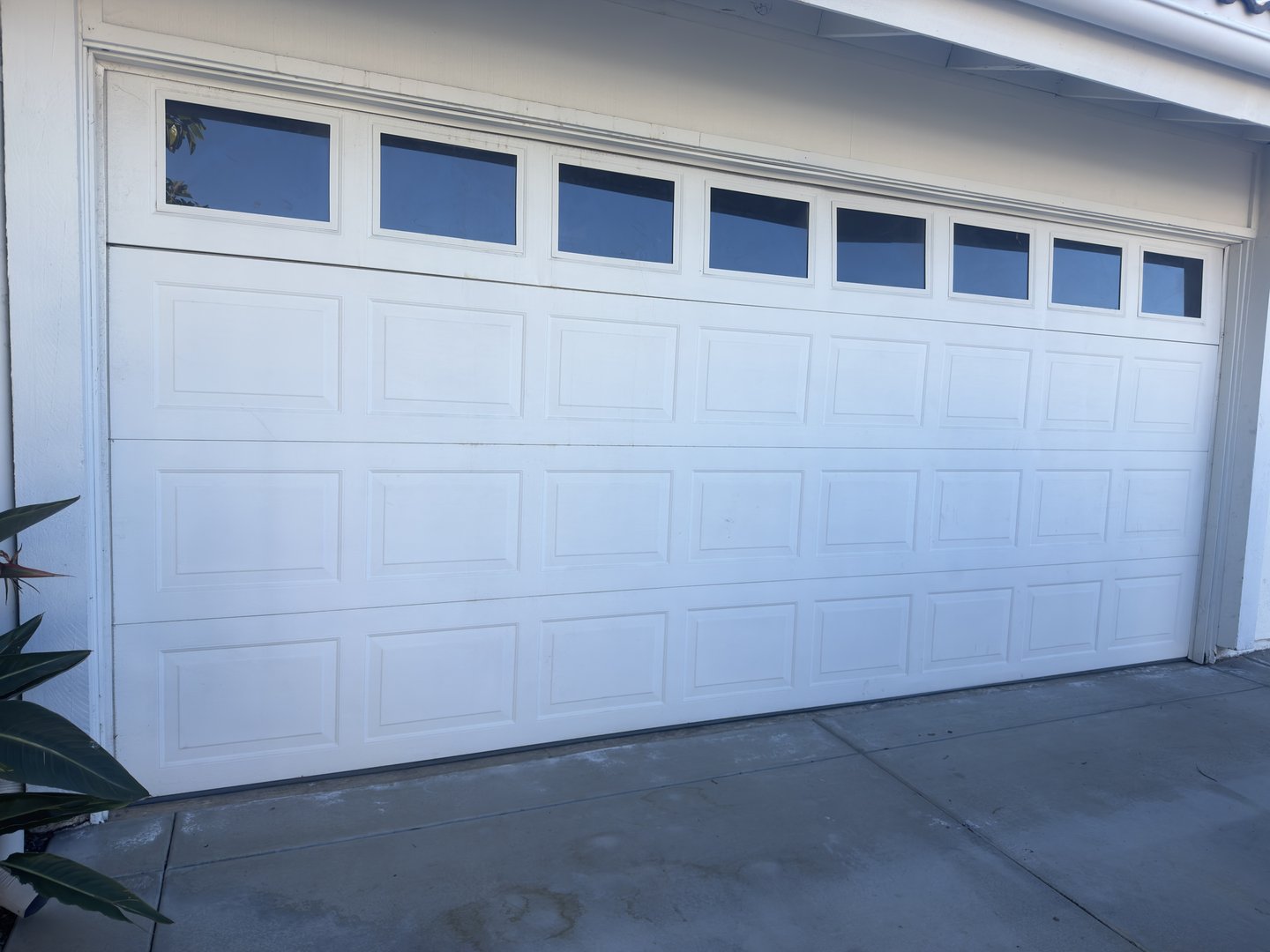 Garage door off track repair